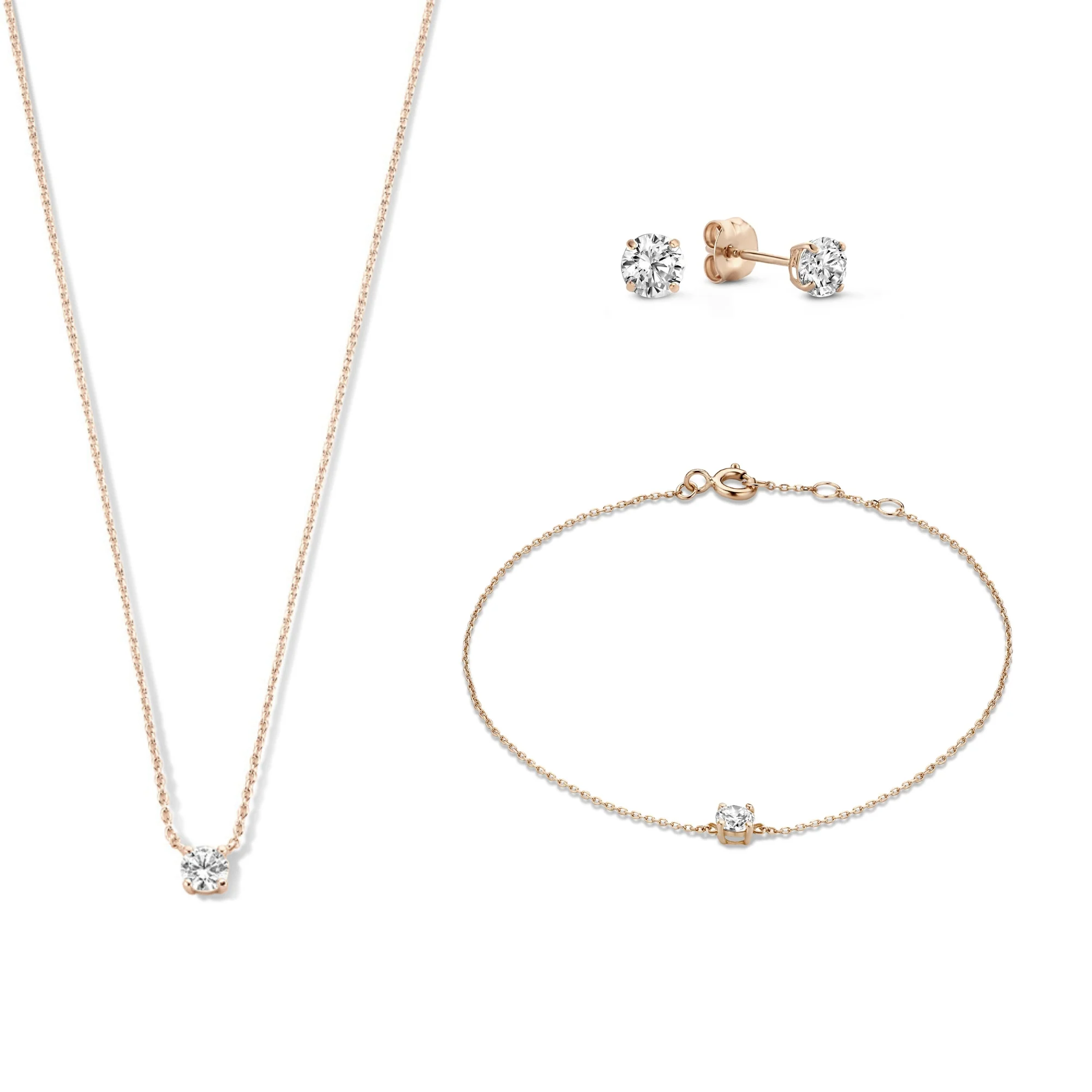 Cadeau d'Isabel 14 karat rose gold necklace bracelet and ear studs set with zirconia